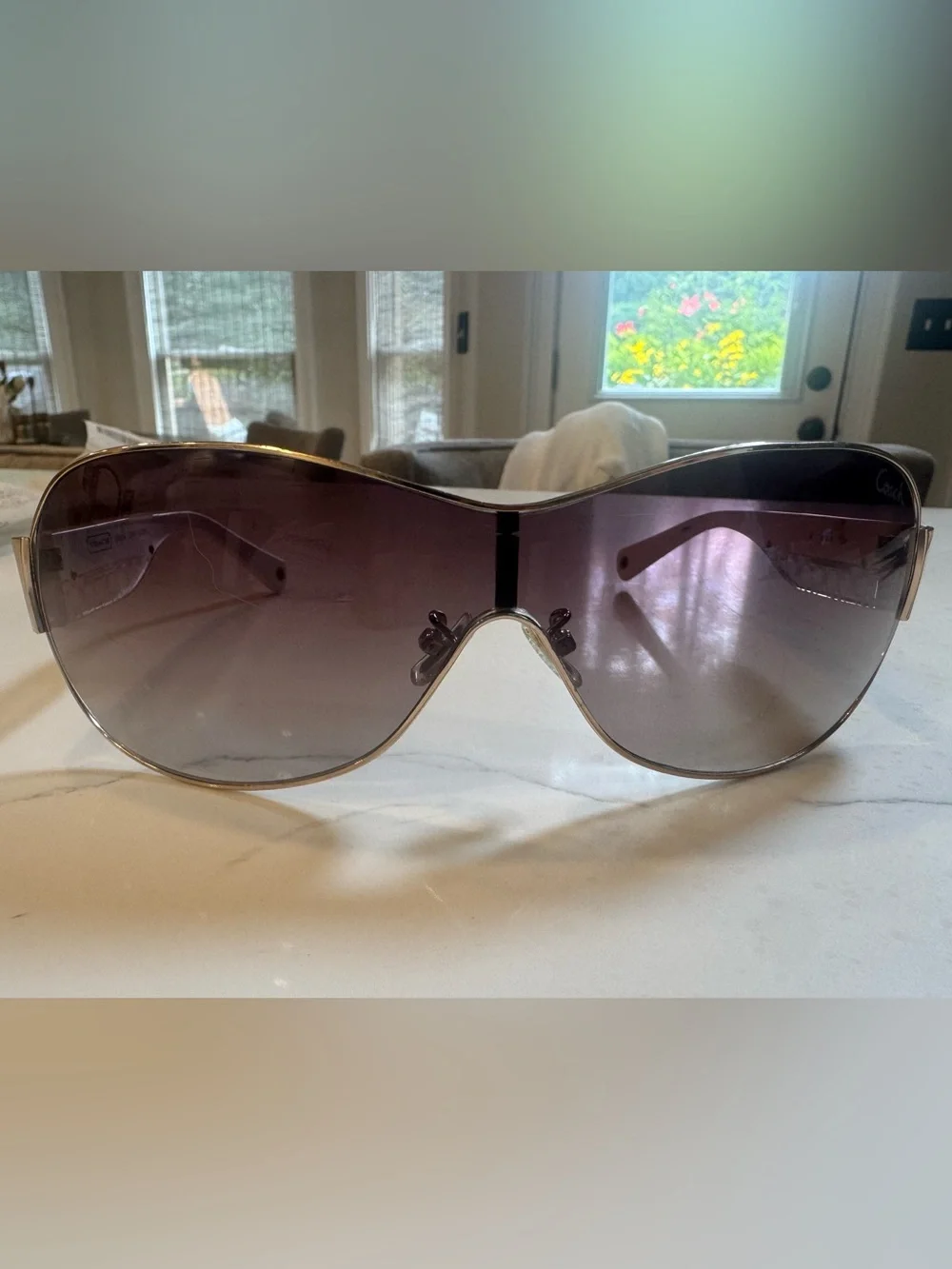 Women’s Coach Leanne S566 wrap golden sunglasses. White with signature C